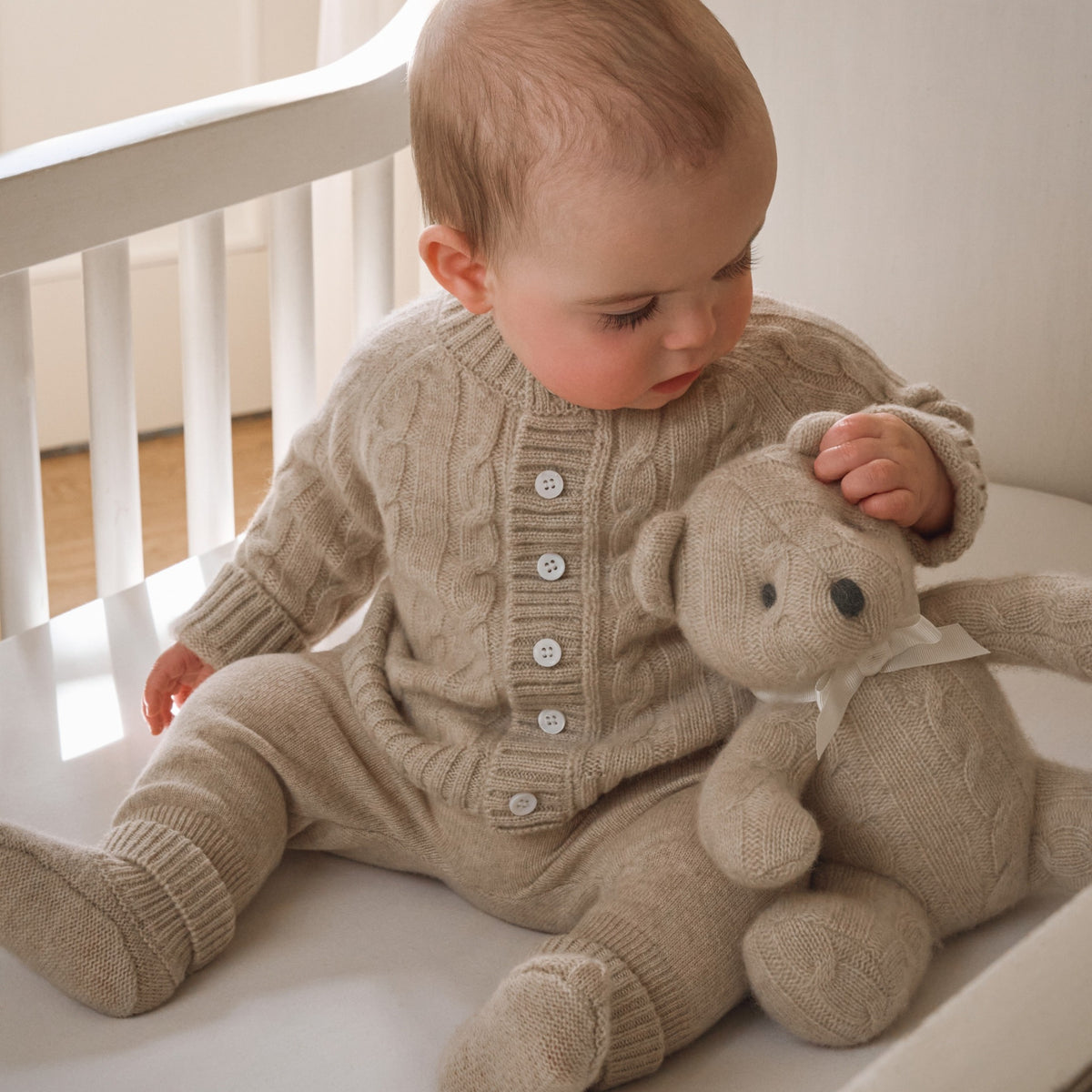 zoomed in Camel 100% Cashmere Knit Baby Cardigan view 2