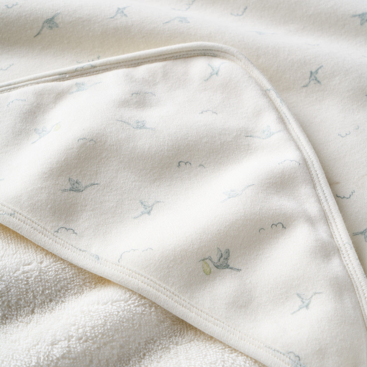 zoomed in Stork Print Bath Wrap view 5